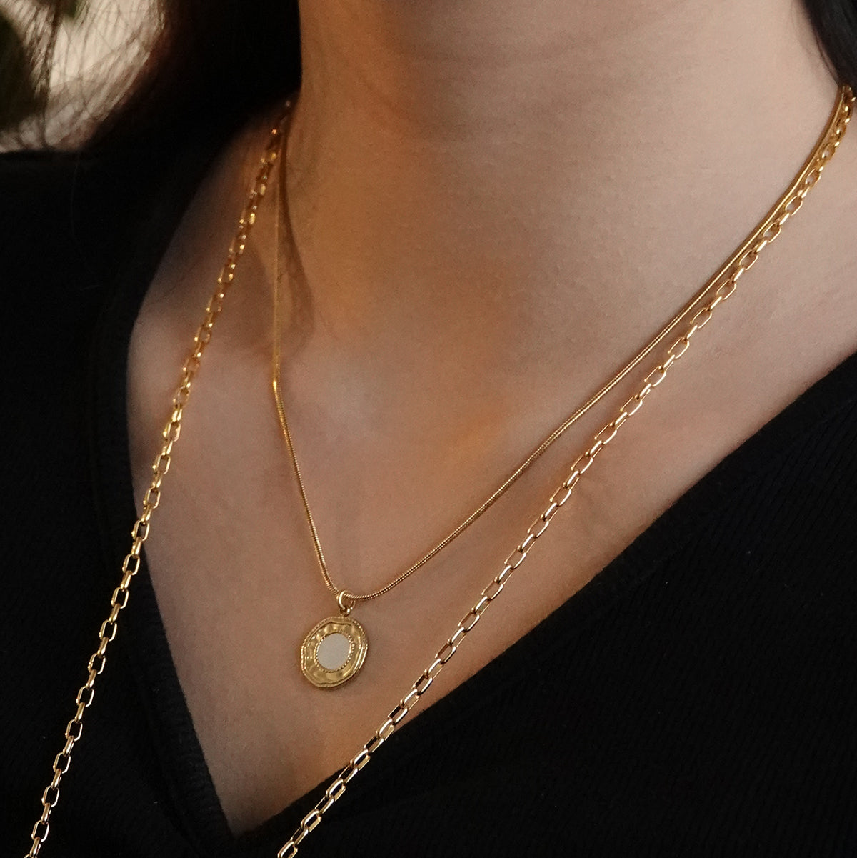Ella ketting met parelmoer hanger