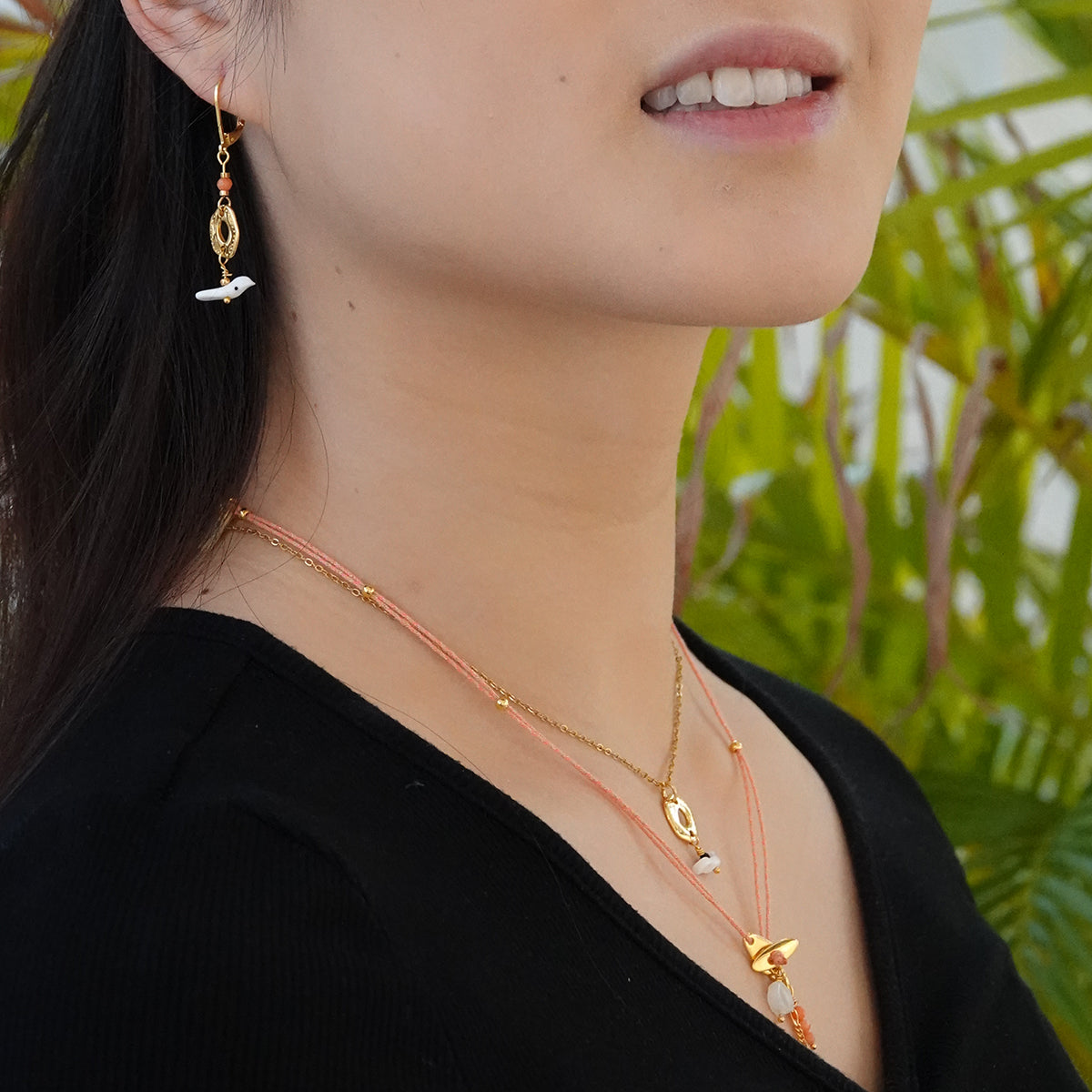 Nona oorbellen met variërende elementen, semi-precious wit