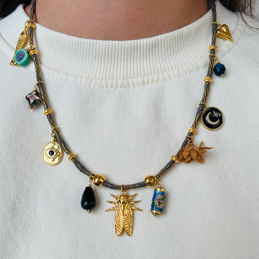 Charm ketting op dik koord