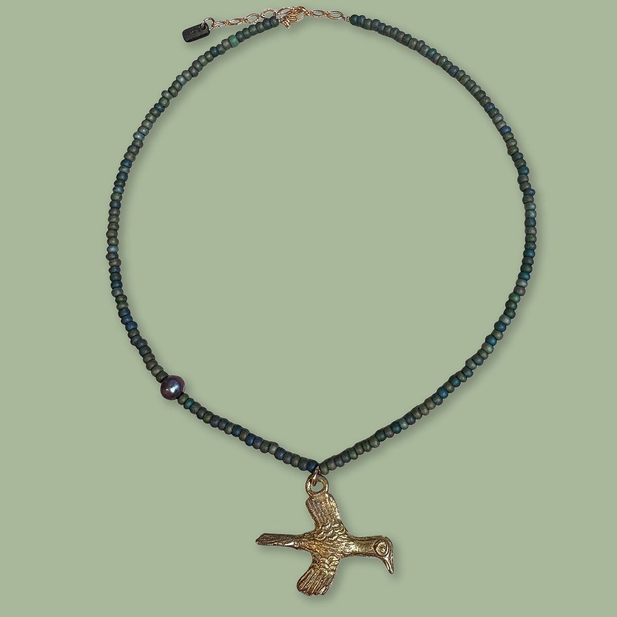 Ketting met bronze vogel
